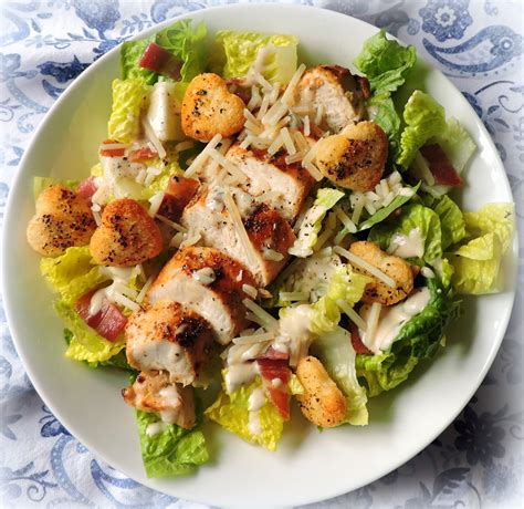 Chicken cesar salad - To make the salad: Chop the lettuce into bite sized pieces. 2 romaine lettuce hearts. In a large bowl, combine the lettuce with the ½ of the dressing, parmesan, and croutons. Toss until …